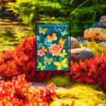 Close-up of a seasonal garden flag on a sturdy stand, surrounded by lush greenery and flowers, showcasing customization, affordability, and durability.