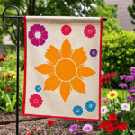 Garden flagpole with wind clips securing a seasonal flag