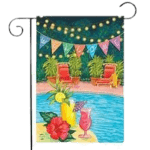 Beach-themed flag in a colorful summer garden