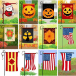A collection of Christmas garden flags and other seasonal flags representing different holidays and occasions, including Christmas, Halloween, and autumn themes."
